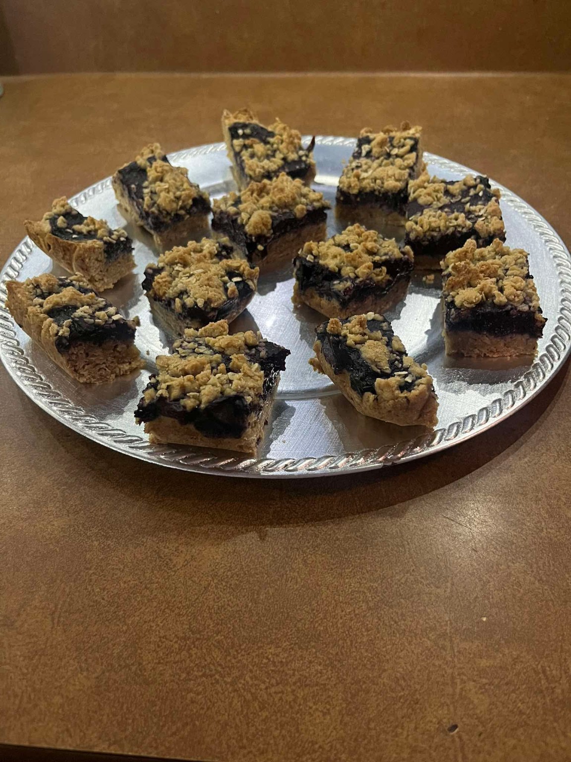 Blueberry oatmeal bars arranged on a round platter